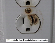 electrical plug burnt hot